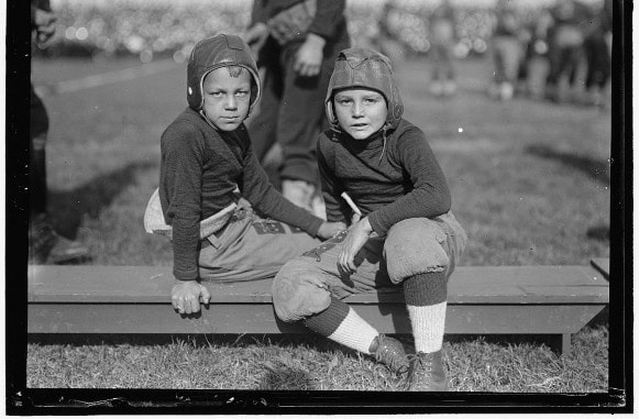 Two young football players